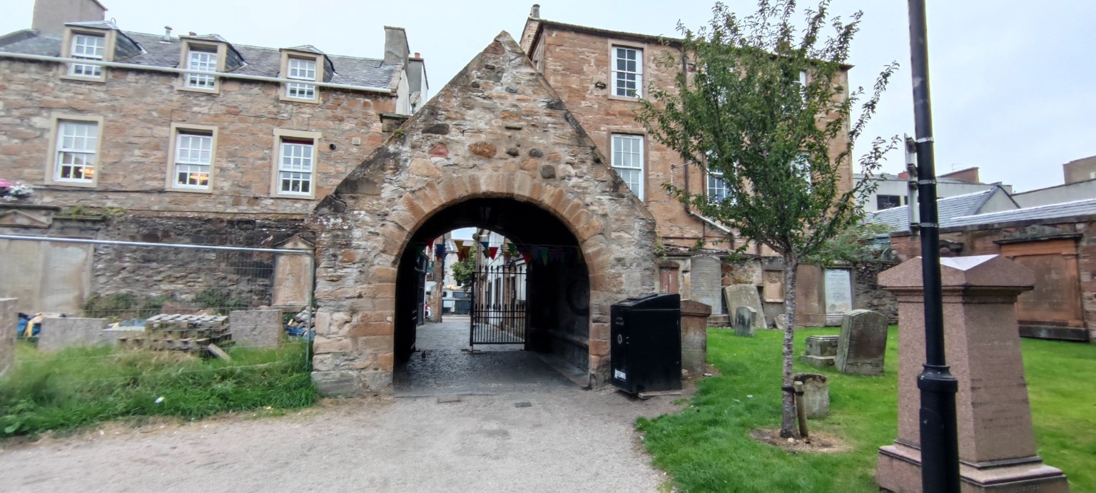 Stone arch and kirkyard in Ayr